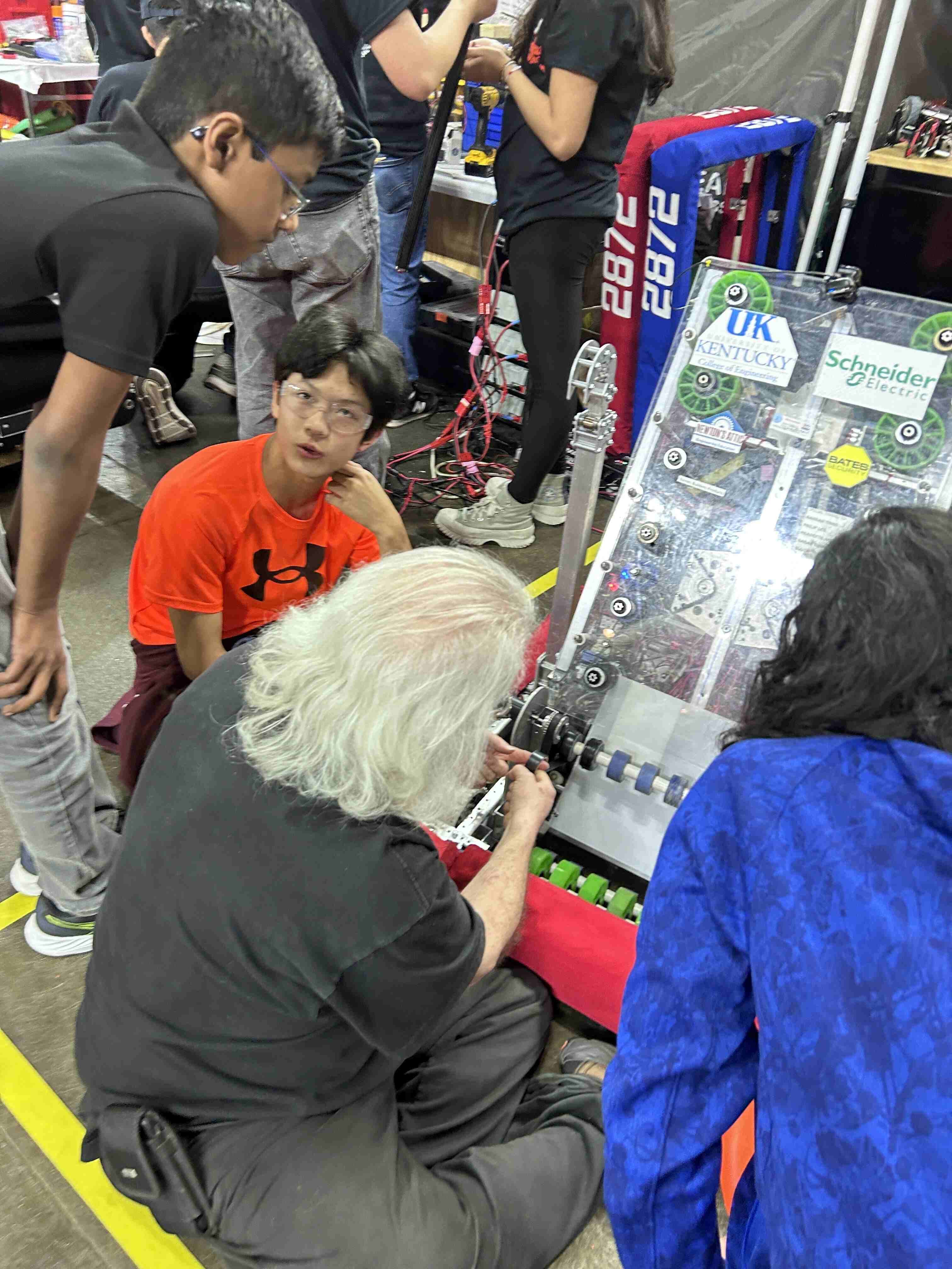 Team working on robot